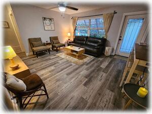 Living Room with Reclining Couch and Land Line