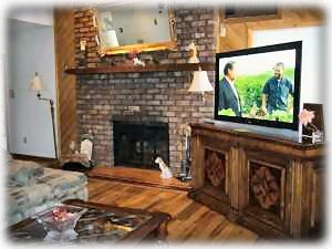 Living Room w/ Fireplace & Plasma TV